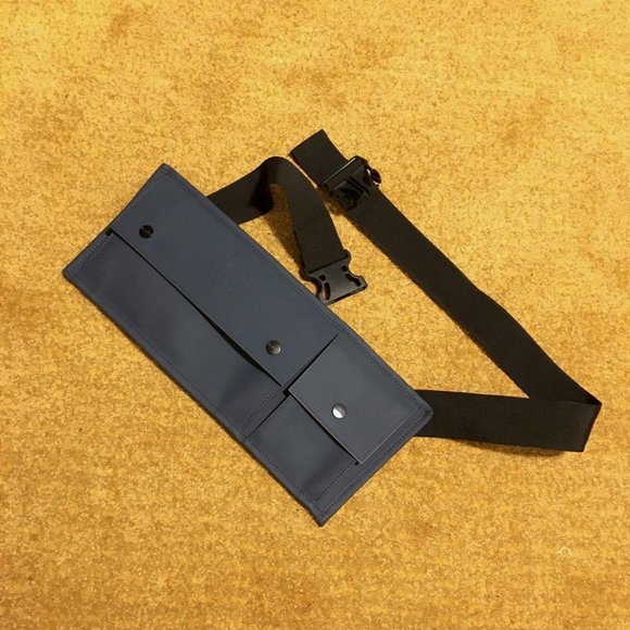 Rains crossbody utility pack / fanny pack in blue with black straps. - Picture 1 of 6